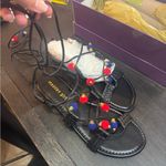 Madden Girl Black Sandals with Red and Blue Pom Poms. Size 8.5. Photo 1