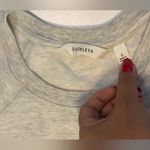 Athleta  Light Gray Long Sleeve Top Photo 3