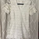 Francesca's Francesca’s White Star Romper Photo 1