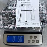 Elegant Women's Black and White Plaid Button Photo 7