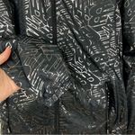 New Balance NEW  Black Silver Foil Monogram Windbreaker Jacket S Reflective Photo 2