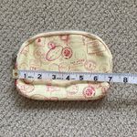 Ipsy  Cosmetic Case Passport Stamps Bag Yellow Orange  5” x 7” Like New Photo 2