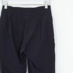 Nike  Womens Dri Fit Woven Bliss Mid Rise 7/8 Joggers Size XS Black Athleisure Photo 6