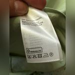 COS  voluminous v-neck light green midi dress, size 8 Photo 13