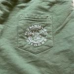 Gymshark 's green athletic shorts Photo 4