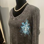 Central Park West Women's Black Long Sleeve Top with Blue Design Photo 1