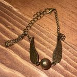 Harry Potter golden snitch bracelet
Any questions just let us know Photo 0