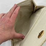 Shimmering Vintage faux leather gold clutch. Photo 5