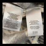 Nine West black/wht crop cardigan sweater. Size Medium. ***Refer to measurements as size tag removed. Beautiful. One large buttons @top. Gently warn & excellent condition. Measurements approximately 19” from armpit to armpit x 16” long. Non-smoking home. Priced at as is condition. Don’t like my price make a reasonable offer! And thank you for checking my closet! Photo 4