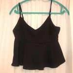 Black Peplum Tann Photo 0