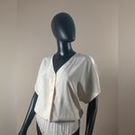 DKNY  100% Silk Beige short‎ Sleeve Ruffle Bodysuit 
Sz 8 
A/2 Photo 1
