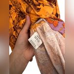 Love the label Smocked Floral Printed Dress Orange Size L Photo 2