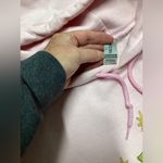 Gildan Festive hoodie. Pink with graphics. Size XL Photo 4