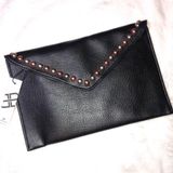 B-low the Belt Studded Clutch Photo 0