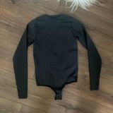 SKIMS Long Sleeve Crewneck Bodysuit Photo 0