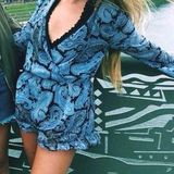 Stella Laguna Beach Long Sleeve Romper Photo 0