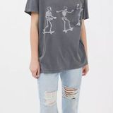 Urban Outfitters skateboarding skeletons tshirt💫 Photo 0