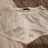 Brandy Melville  silk white shorts Photo 0