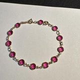 Swavorski Women’s Swarovski Crystal Gold Tone Pink Tennis Bracelet With Extension Photo 0