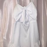 Showpo White Ruffle Tie Romper Photo 0