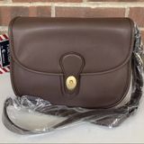 Boutique Mocha Color Carryland Crossbody Purse • Made from Vegan Leather •NWT Photo 0