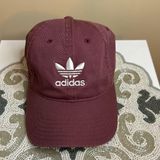 Adidas Women’s maroon  hat Photo 0