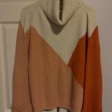 South Moon Under Sweater Photo 0