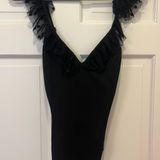 About Us Black Bodysuit Photo 0