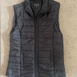 Rue 21 black puffer vest size small Photo 0