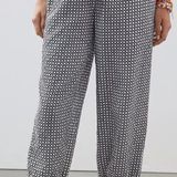 Anthropologie Ollari  Women's Tasseled Joggers Size Large Black & White Photo 0