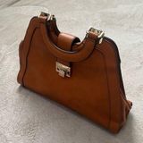 Skinny Purse Photo 0