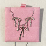 Boutique Bow Necklace and Earrings Set Silver Photo 0