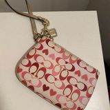 Coach Wristlet Pink And Gold Photo 0