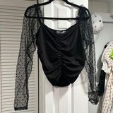 Miss Look  black long sleeve top with mesh sleeves Photo 0