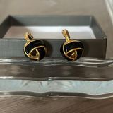 Monet black enamel gold knot clip on earrings vintage signed Photo 0