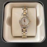 Relic BY FOSSIL-TWO TONE WATCH Beautiful gold and silver tone stainless steel watch with little diamond rhinestones, excellent condition, I have attached a video showing the watch works great. Photo 0