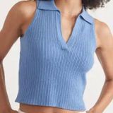 House of Harlow Chic ribbed tank with a collared V-neck. Soft and stylish for versatile wear.   1960 Light Blue Ribbed Tank Top Photo 0