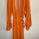 Eloquii Orange and Pink Animal Print Wrap Dress Photo 0