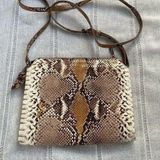 A New Day snakeskin print crossbody bag. Photo 0