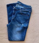 Rockstar Mid Rise Jeans Photo 0