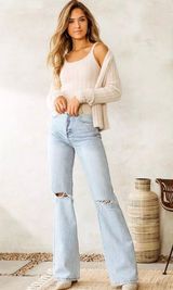 Distressed Flare Jeans Photo 0