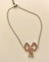 NWT Coach Pave Pink Swarovski Crystal Bow/Ribbon Slider/Slide/Bolo Bracelet Photo 0