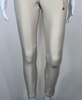 WeWoreWhat Solid Rib Scoop Jumpsuit in Khaki with Gold Chain Belt Photo 0