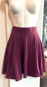 NWOT  Pins & Needles burgundy skirt. Sz M Photo 0