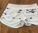 size 4, 2.5in, LULULEMON speed ups, miami pink and white, old color way. Photo 0