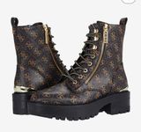 Guess  Fearne pull on side zipper ladies boots. Size  9 1/2 Photo 0