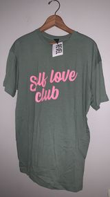 Sweet Claire green graphic T-shirt with hot pink writing ‘Self Love Club’ Photo 0