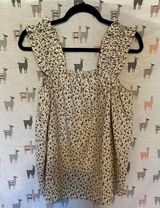 Boutique tank flowy material, no size tag bought as a large Photo 0