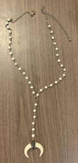 cream horn necklace Photo 0