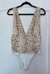 Vestique Bodysuit Photo 0